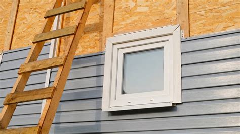 exterio windows with siding chanel|caulking vinyl siding windows.